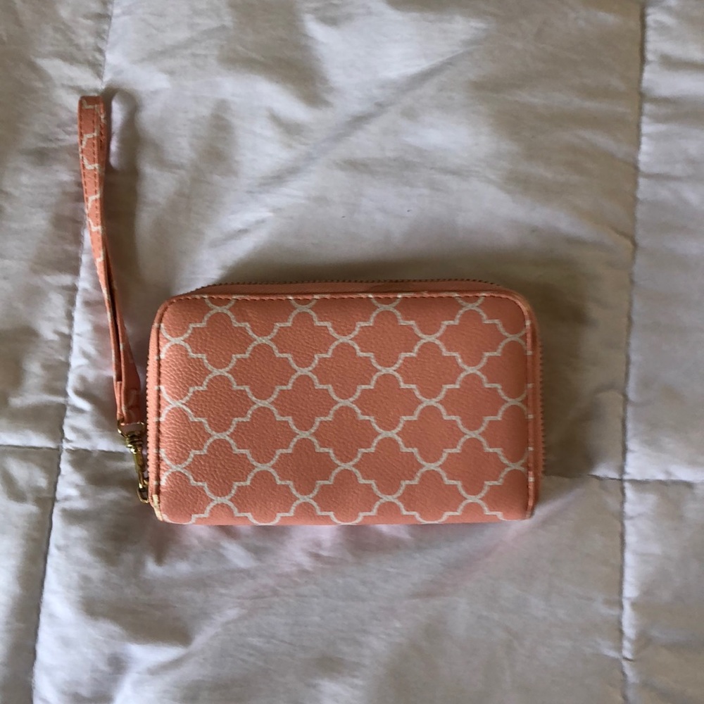 Cute little peachy colored wristlet